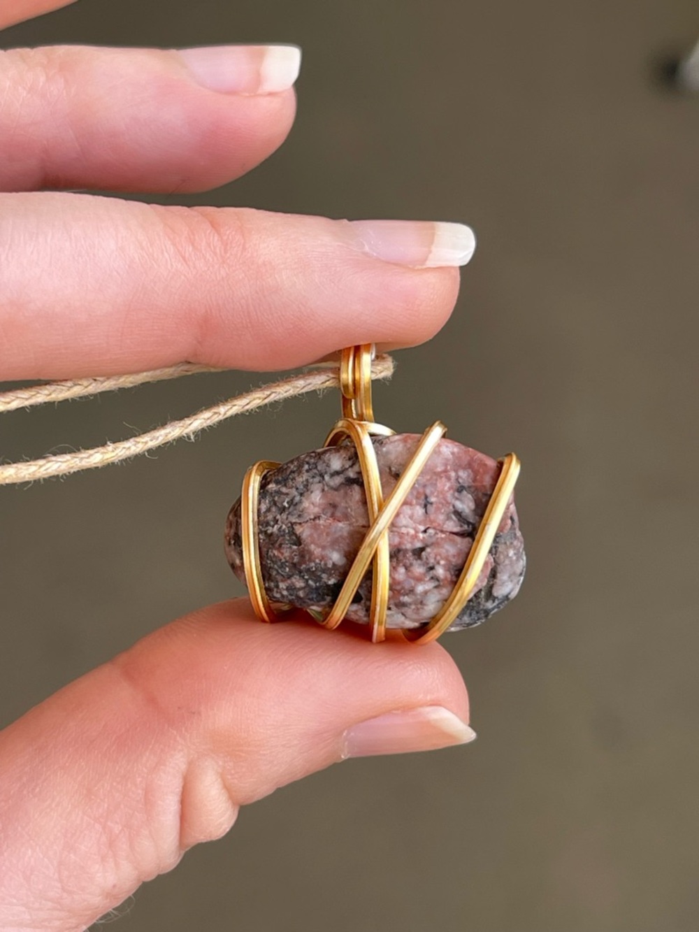 Dainty Rhodonite Gold Tone Wire Wrap Necklace on Tan Cotton Twine